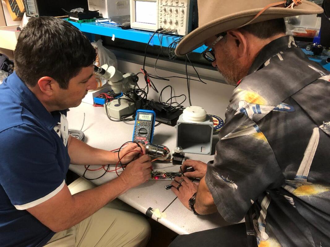 Eddie Villanueva and Robert Wimmer from the AQMD working with ELAC on weather stations and air quality monitoring throughout the Los Angeles air basin