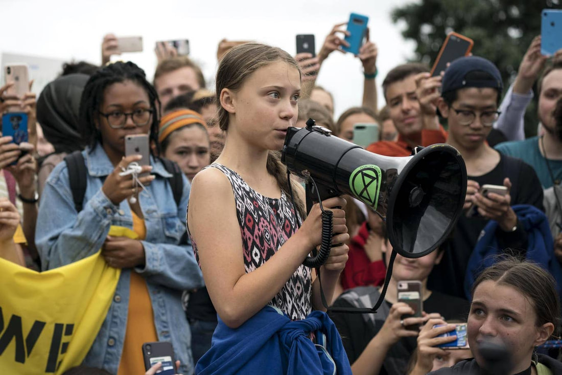 Greta Thunberg and other young activists in Madrid.